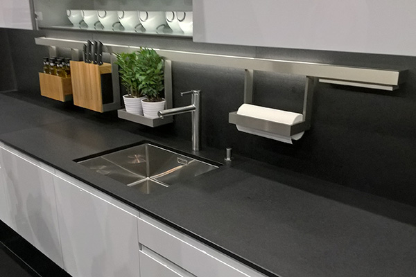 Undermounted kitchen sink in grey kitchen worktop